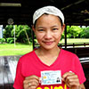 Girl holding ID card